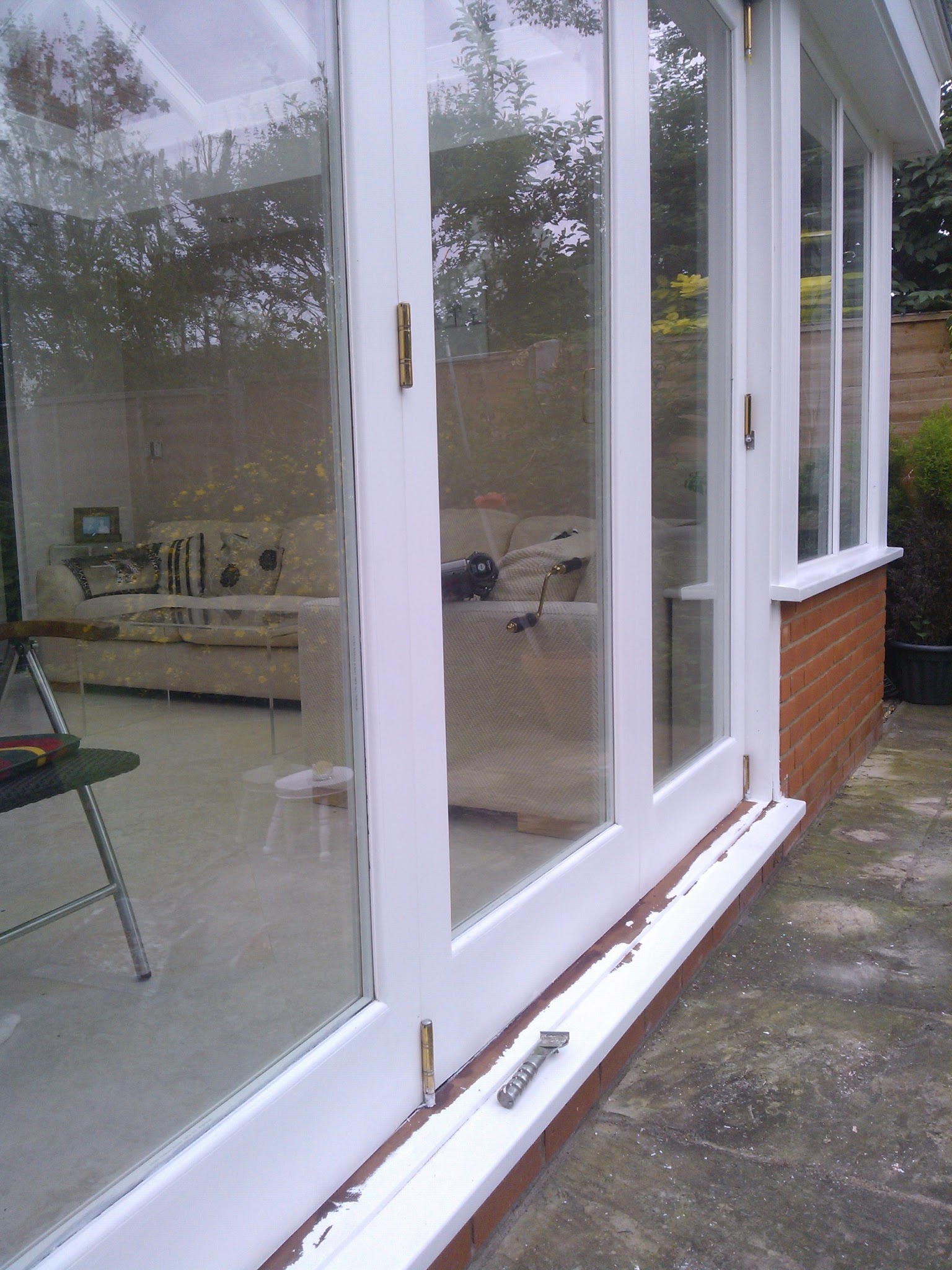 White painted timber garden room doors